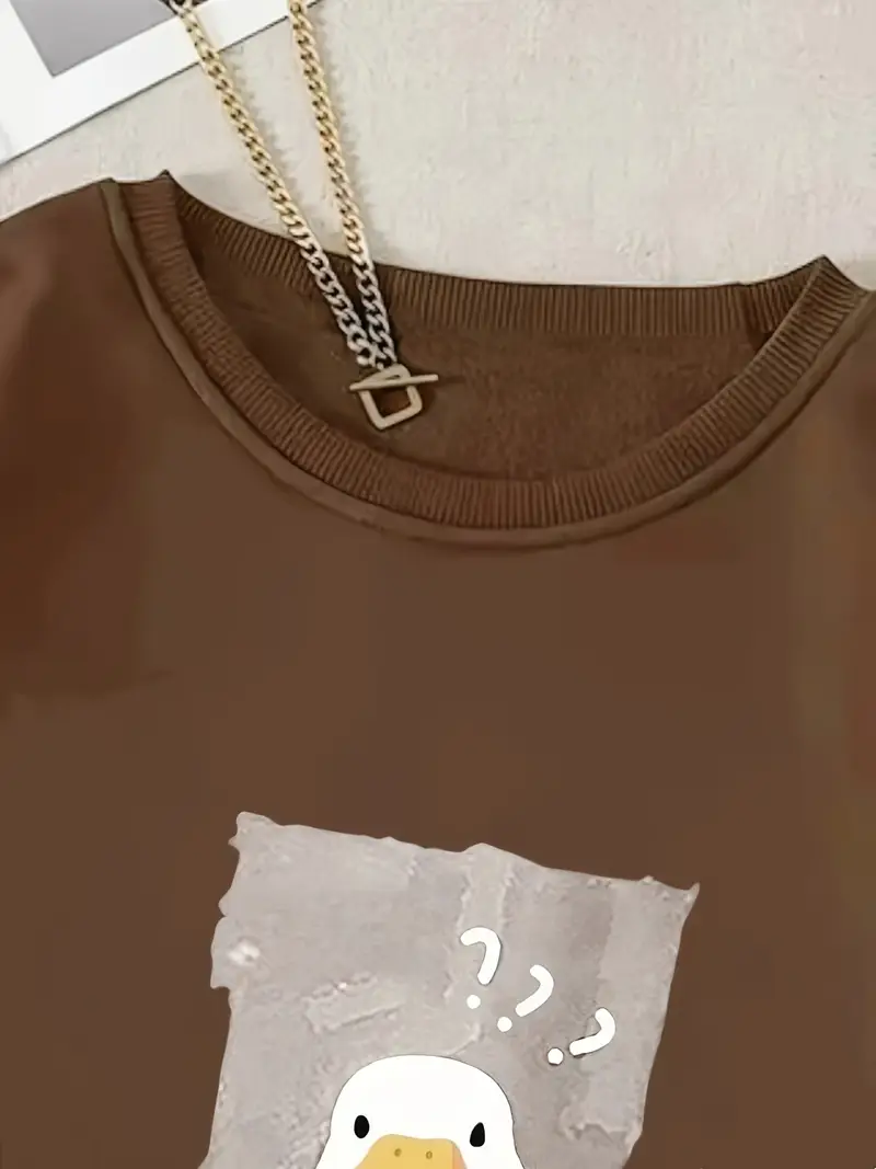 pull femme à col rond imprimé canard cartoon - sweatshirt décontracté chaud pour lhiver, manches longues marron , lavable en machine, coupe regular confort , vêtement de loisir durable, design ludique, tissu confortable, alternative au hoodie, style streetwear Détails du produit 2