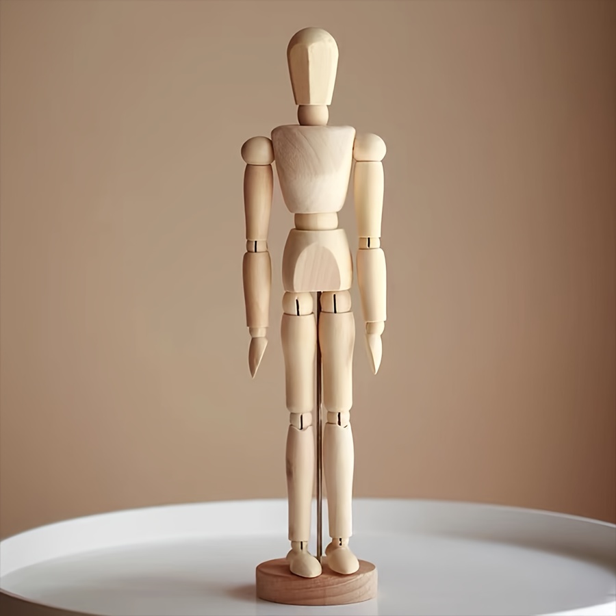 

A .5-inch Wooden Mannequin With Flexible , Specifically For Sketching And Artistic Purposes, Suitable For Drawing And Needs.