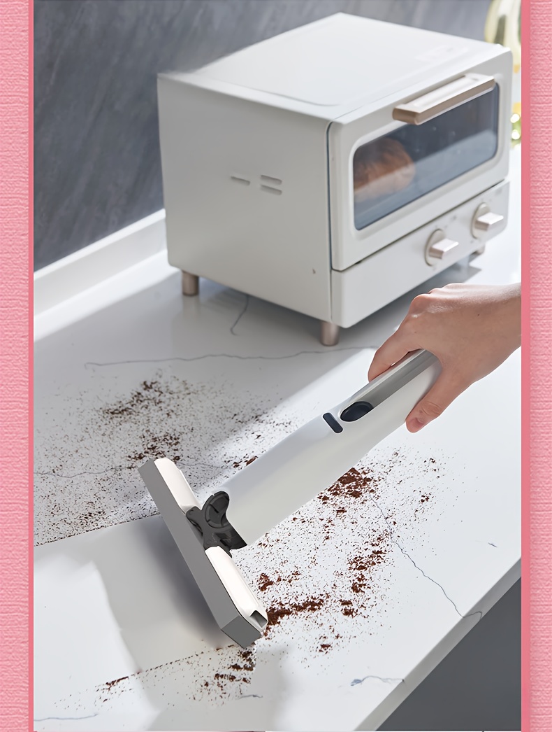 Handheld Multifunctional Cleaner, Equipped with Replaceable Mop Heads And a Hook. The Rotating Mop Head Allows for Easy And Forceful Cleaning of Gaps And Corners in Sinks, Pet Urine, And Desktop Debris. A Portable Marine Cleaning Mop/Tool.