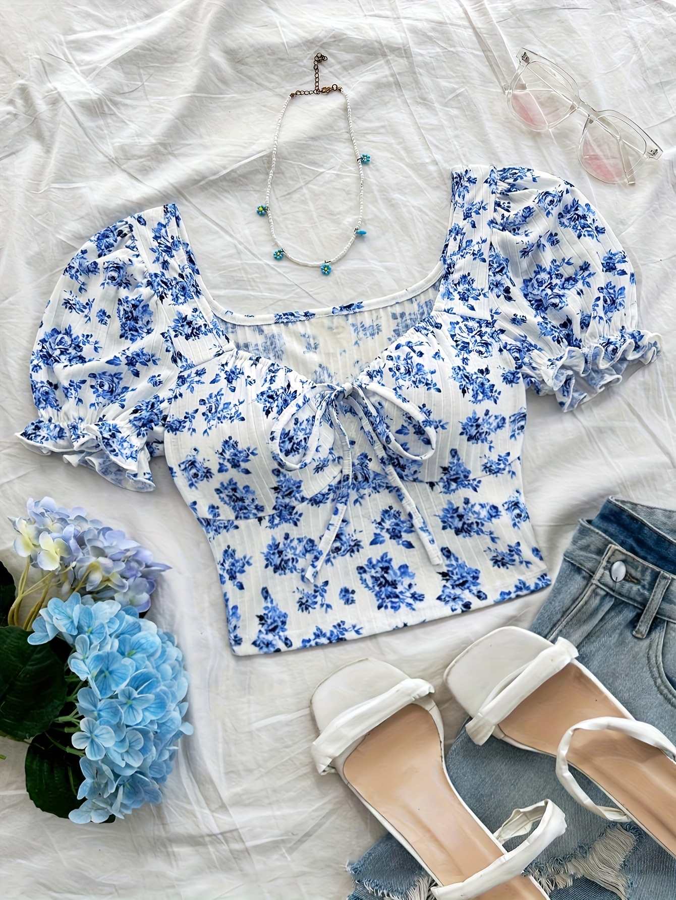 blue floral top sold on Temu United States