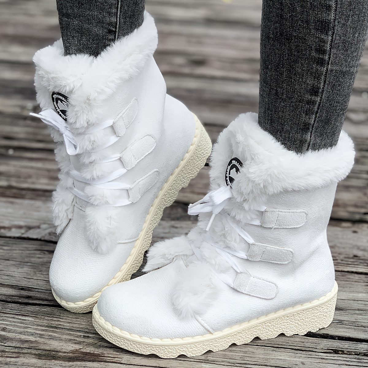 ladies winter footwear cozy   calf boots designed for snow featuring a lace up style Product details 9