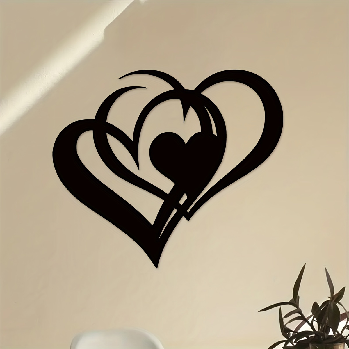 

Une Magnifique Œuvre D'art En Métal Représentant Deux Cœurs, Idéale Pour Décorer Les Murs De Votre Maison Et Offrir Un Cadeau Unique.