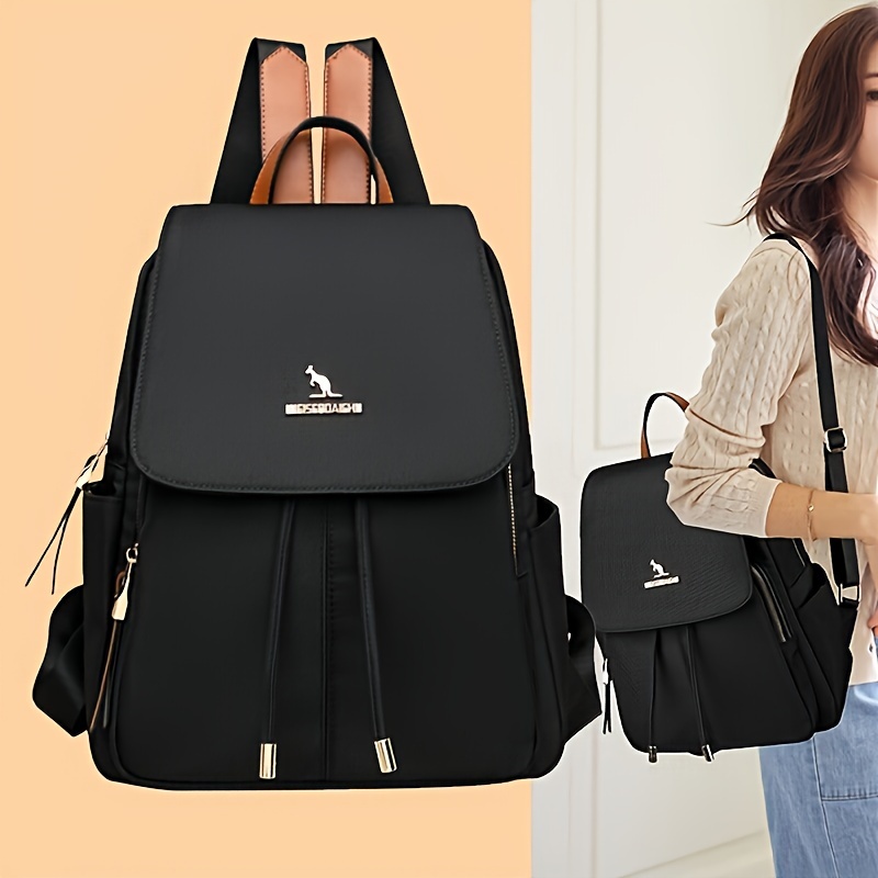 

Petit sac à dos noir avec plusieurs poches, sangle à bandoulière réglable de style décontracté, sac de voyage tendance pour les étudiants et les utilisateurs quotidiens.