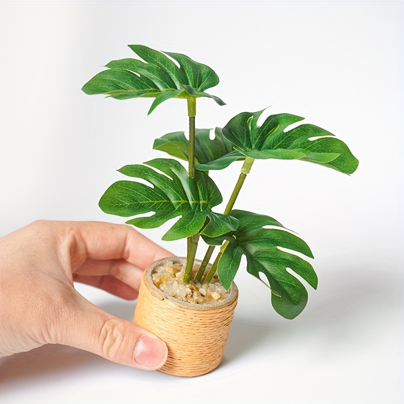 Miniature Artificial Greenery, a Very Small Replica of a Monstera Plant, Perfect for Desk Decoration, Small Desktop Ornament, Compact Size, Mini, Scaled-Down Plant, Faux Plant, Tiny Monstera, Decorative Piece for Bedroom Desk