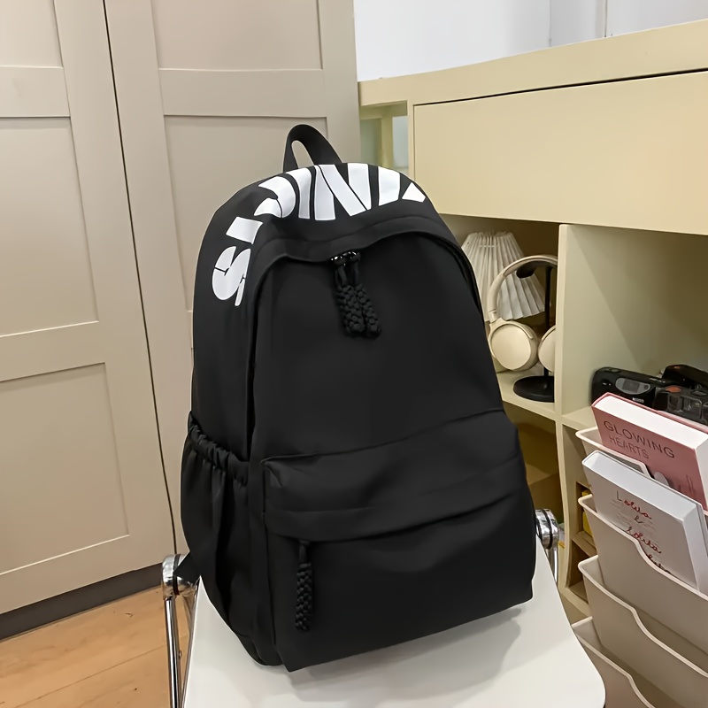 Image of Fashionable Women's Black Nylon Backpack - Lightweight, Adjustable Straps, Foldable Design, Tablet Compartment, Casual Travel And College Bag, "" Printed, School Backpack