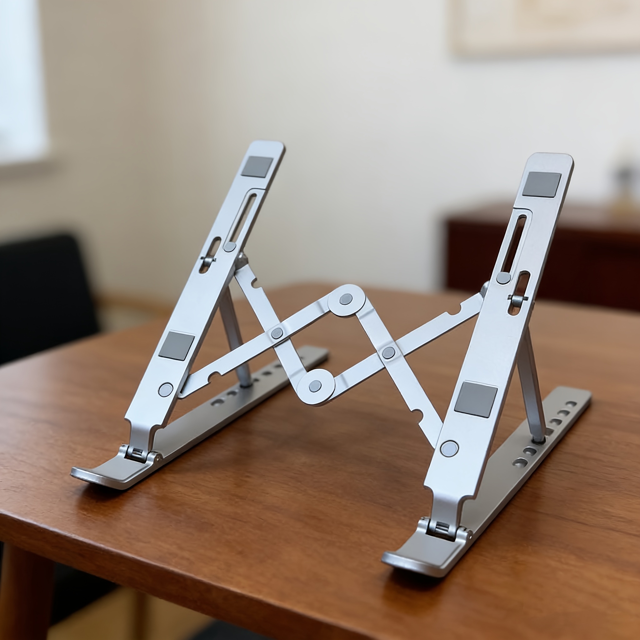 1pc laptop stand made of aluminum alloy with non slip silicone 7 height adjustment settings   suitable for office business gaming watching compatible with   inch tablets and laptops Product details 3