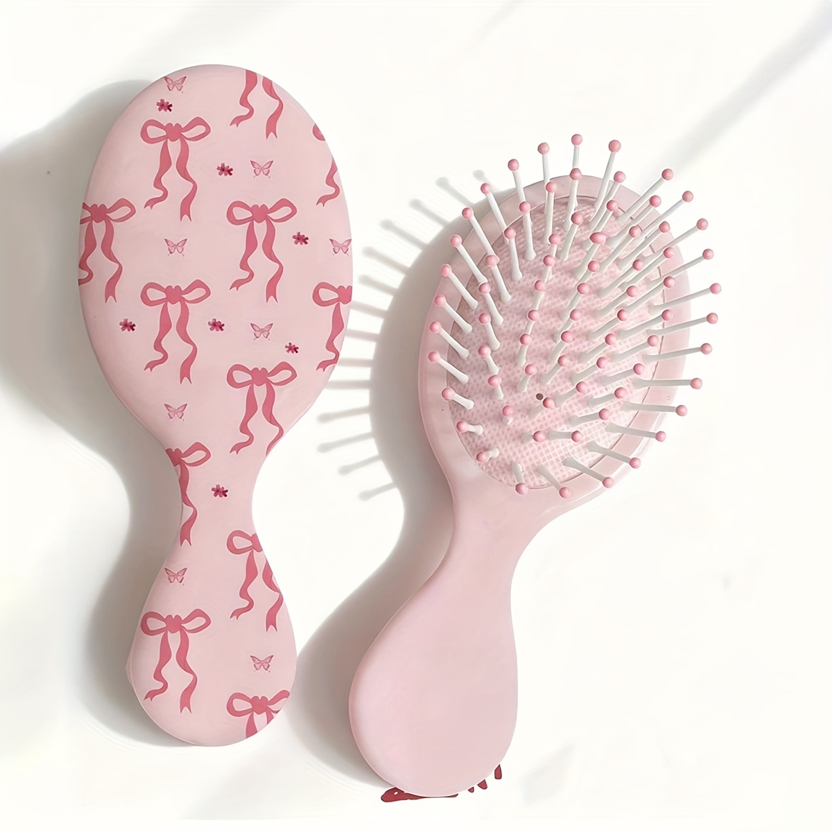 E-shop Schleifen-Blumenmuster Luftkissen Kamm Haar Massage Kompakt Mini Kleinkamm Niedlicher Airbag Kamm (Kammzähne Farbe Zufällig)