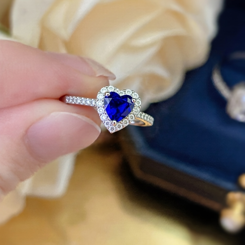 TEMU Anello da donna ed elegante regolabile con centrotavola a forma di cuore in Zirconia incastonata in rame. Disponibile in anelli a forma di , blu
