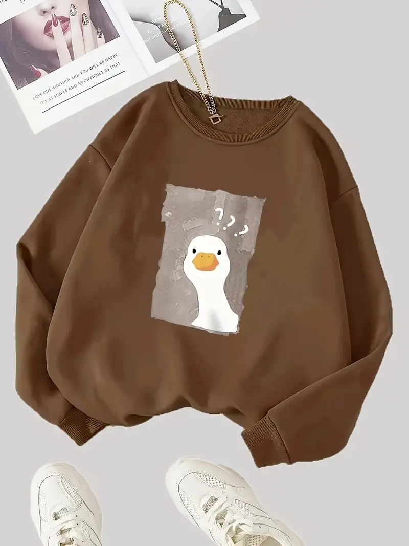 pull femme à col rond imprimé canard cartoon - sweatshirt décontracté chaud pour lhiver, manches longues marron , lavable en machine, coupe regular confort , vêtement de loisir durable, design ludique, tissu confortable, alternative au hoodie, style streetwear Détails du produit 1