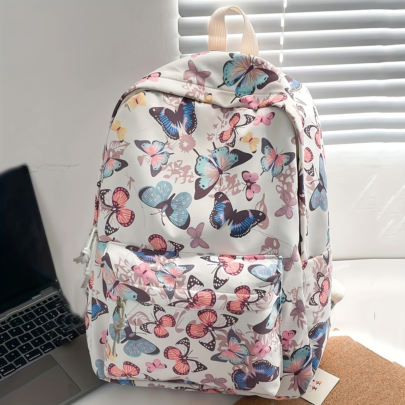 

Sac à dos floral papillon, sac d'école multi-poches, idéal pour le collège, sac à dos élégant pour la journée en plein air