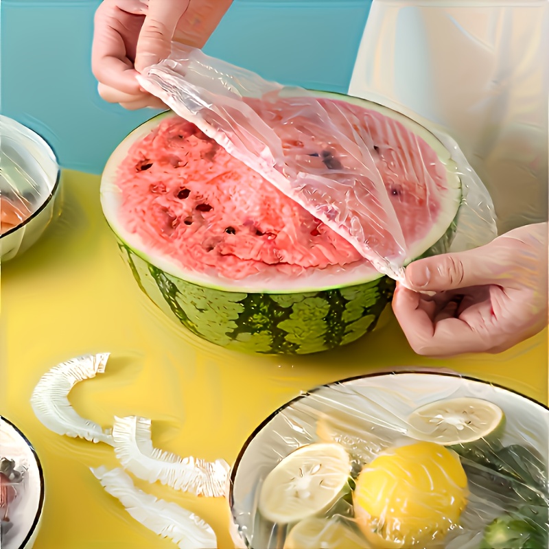 100 pcs disposable food grade plastic wrap freshness sealing lids suitable for food storage home kitchen picnics barbecues multi functional freshness preserver for bowls plates fruits vegetables transparent kitchen freshness covers