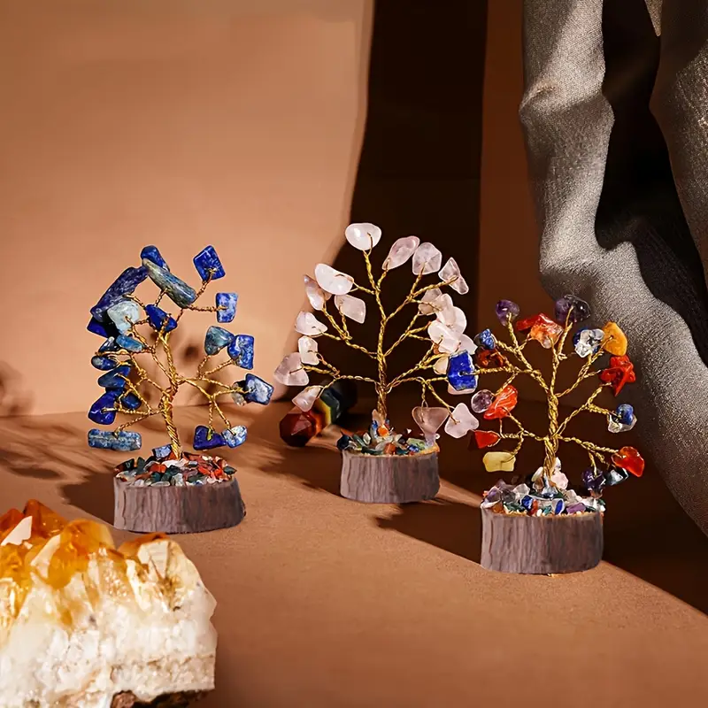 a box containing 12pcs of chakras crystal tree designed for shui this tree symbolizes fortune and serves as a decoration making it a thoughtful gift for new years and christmas spiritual decor holiday gift elegant design aesthetic ornament detailed premium materials decorative chakra tree crystal lovers spiritual Product details 5