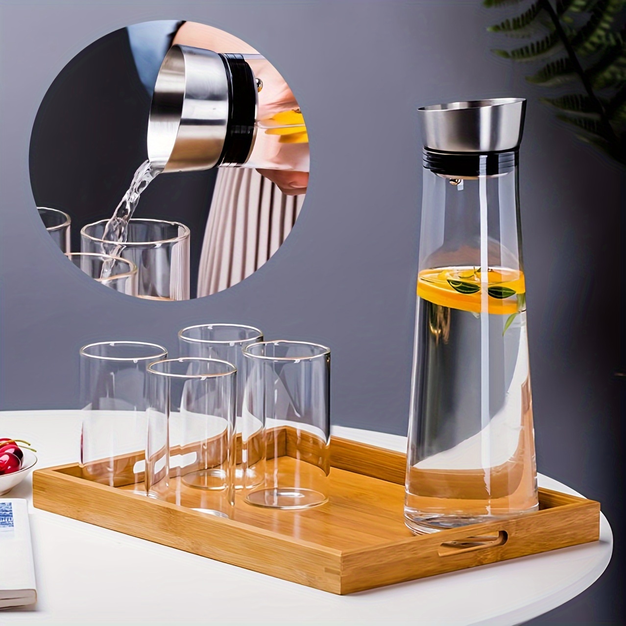 

Une carafe en verre de 33.8 oz avec un couvercle en acier inoxydable, élégante et résistante aux hautes températures, pour jus, résistant aux explosions, pichet à boisson pour bar, restaurant