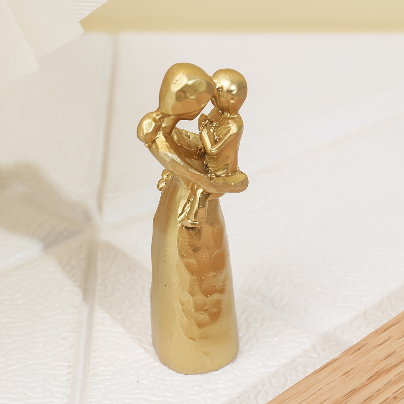a decorative figurine of a mother and Product details 4