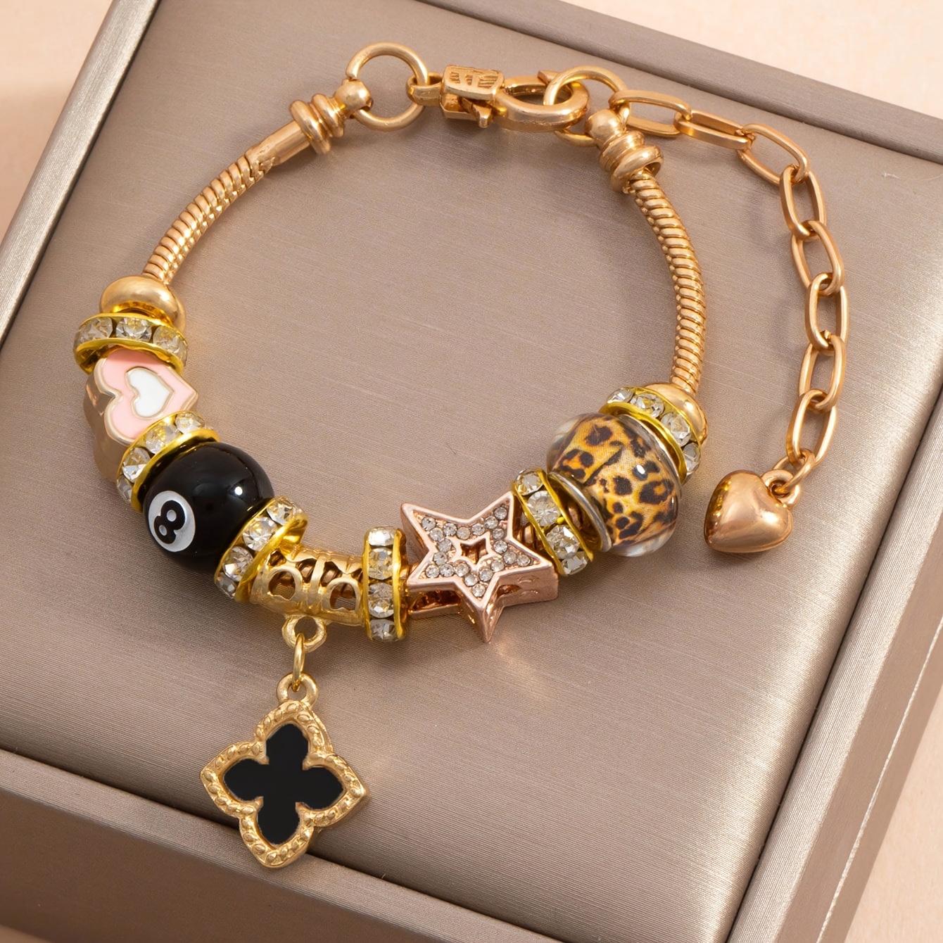 TEMU Bracelet tendance 1 pièce avec pendentif à feuilles , breloques nœud, fleur à pétales, , ballon de football et croix