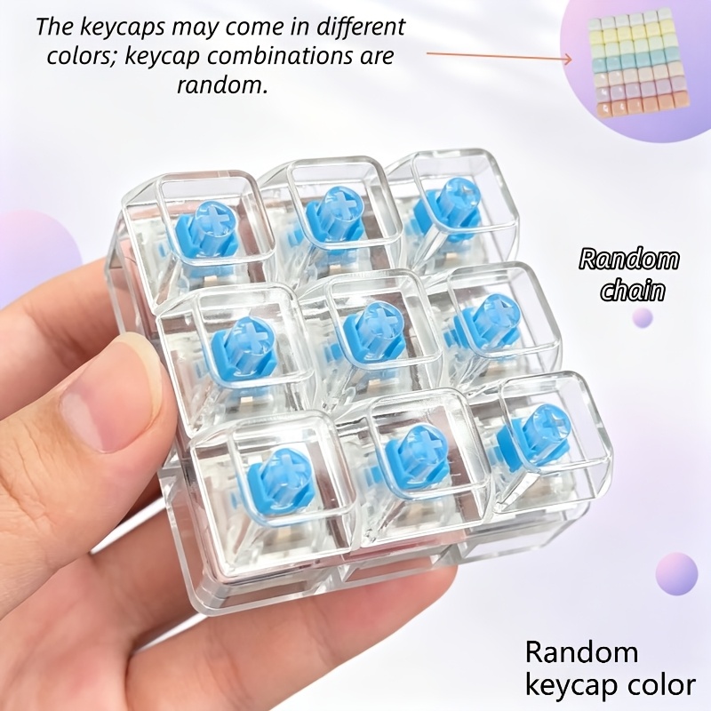 TEMU This Smooth And Rounded Stress-relief Nine-key Keychain Features A Wide Base And A Keyboard-style Squeeze Toy. With 9 Keycaps And A 9- Backpack