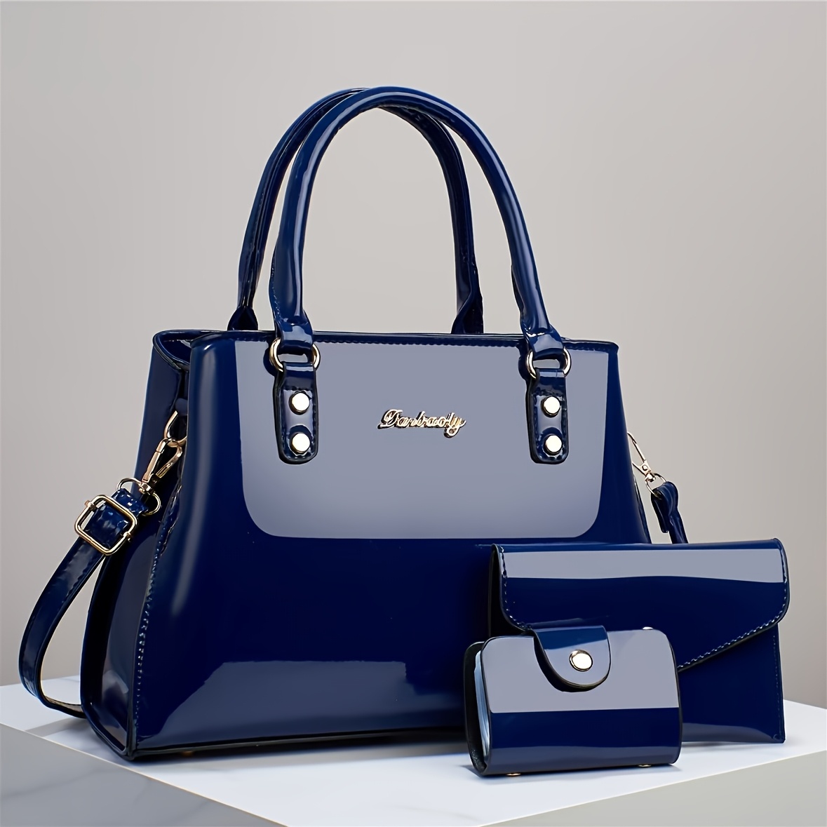Trendy And Versatile Women'S High-End Multi-Layer Bag Set, Featuring a Stylish Casual Crossbody, Shoulder Bag, And Large-Capacity Tote in a Glossy Patent Finish.