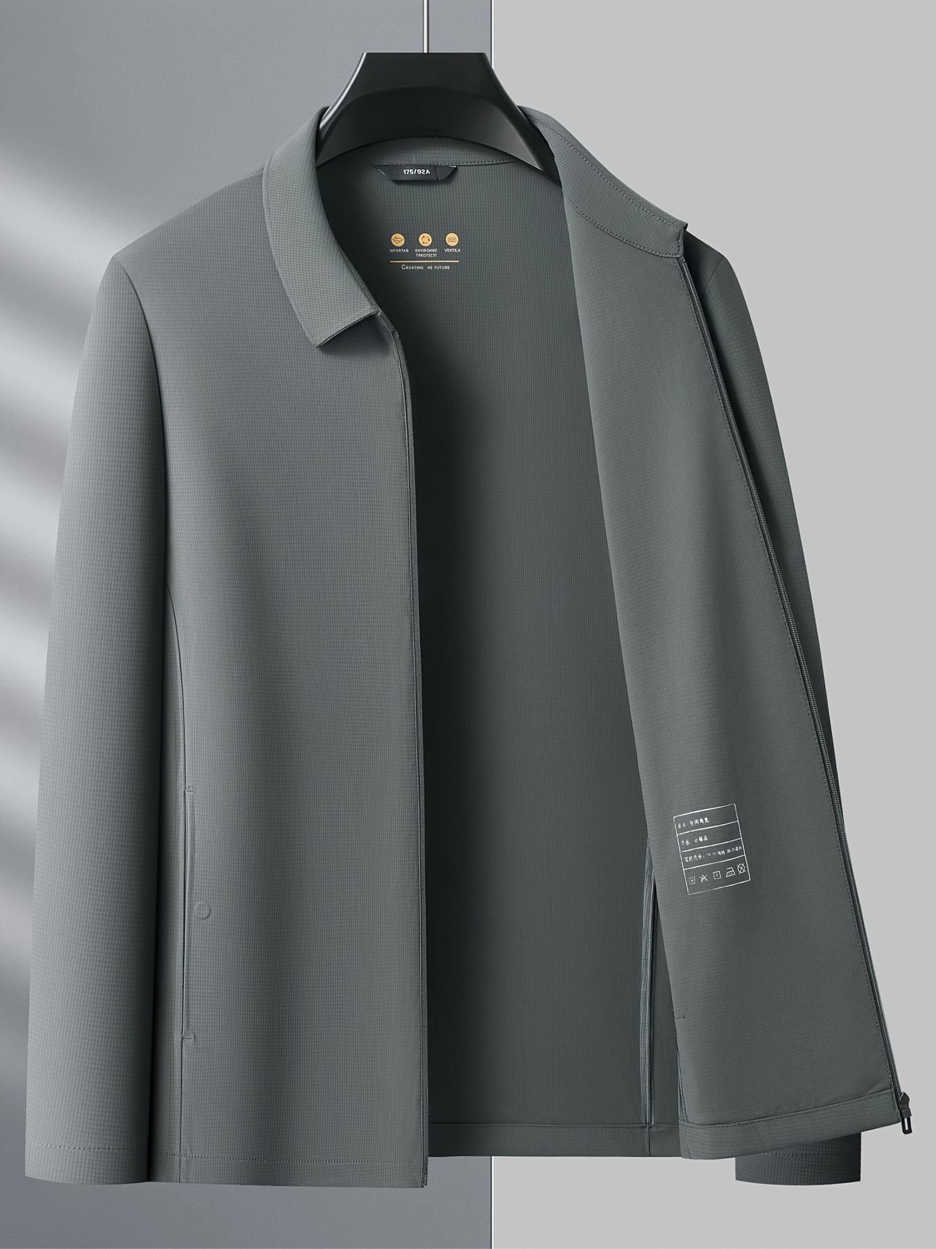 ultr weight breathable jacket for men featuring a lapel design solid color zippered front side pockets and   beige hue for  