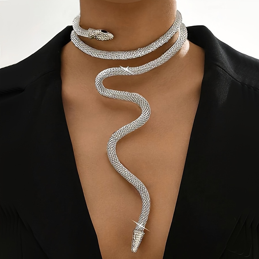 

A Middle Eastern Silvery Fashion Exaggerated Adjustable Simulated Snake Mesh Chain Necklace That Fits Around The Neck.