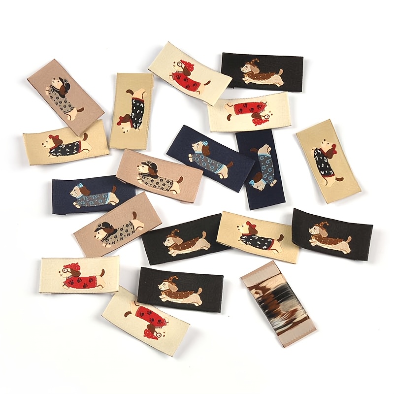 50pcs 1.9x4cm Puppy Pattern Mixed Fabric Tags, Collar Tags, Hemmed Fabric Labels, Handmade Sew-on For Bags And Scarves, No Adhesive Backing