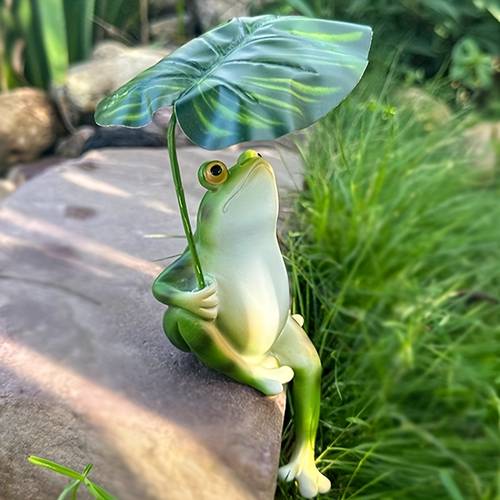 A Whimsical Frog Resin Statue Designed in a Parasol Pose, Perfect for Decorating Home Gardens, Balconies, And Outdoor Spaces