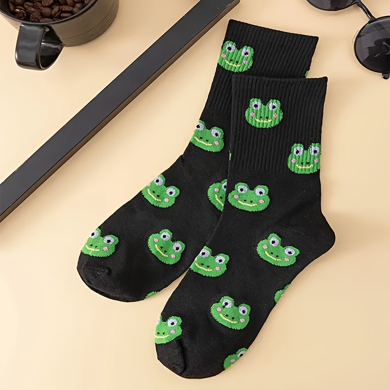 A Pair Of Women's Mid-calf Socks Featuring A Creative , Unique And Trendy