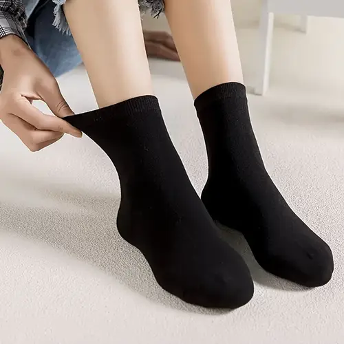 solid black unisex socks breathable solid color elastic cuffs loose breathable sweat wicking and anti odor socks machine washable comfortable and simple calf socks