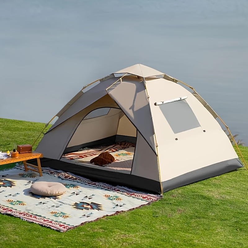 صورة العنصر خيمة تخييم أوتوماتيكية تنبثق لأربعة أشخاص للتخييم في الحدائق والمشي لمسافات طويلة في الهواء الطلق وعطلات   على  . تصميم قابل للطي ومحمول. هدية مثالية للهالوين والكريسماس