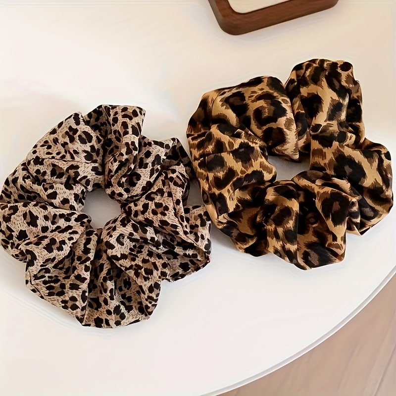 TEMU 2 Pezzi di Legami per Capelli a Stampa Leopardata per Donne - Fascie Elastiche Morbide per Code, & Uso , Accessori Eleganti con Stampa Animalier