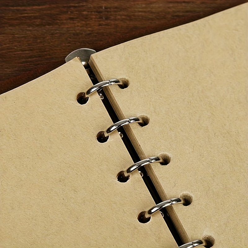 A Vintage Leather Notebook with a Matte Finish - Features an Antique Pirate-Themed Maritime Compass Design, Hardbound Writing Journal with a Metal Clasp And Spiral Binding.