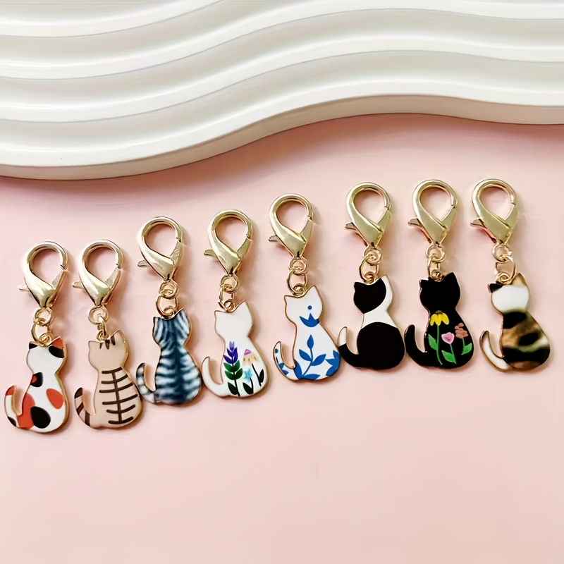 E-shop 8-teiliges Schlüsselanhänger-Set mit süßem Katzenmuster - Zinklegierung, modisches Accessoire für Männer Schüler