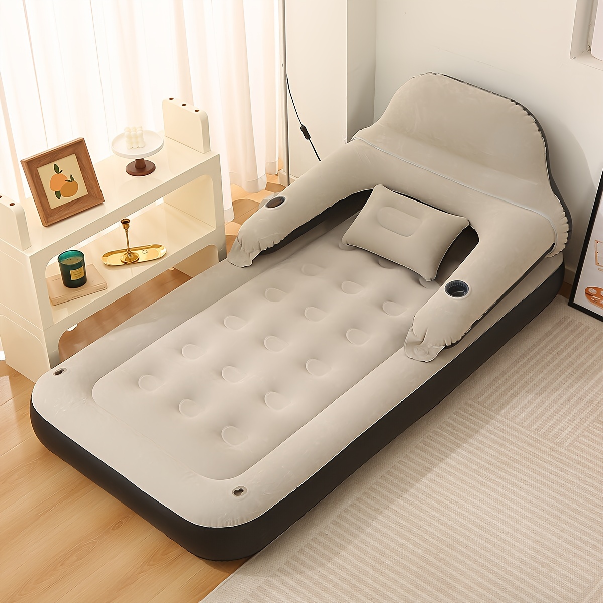 Inflatable bed outlet pillows