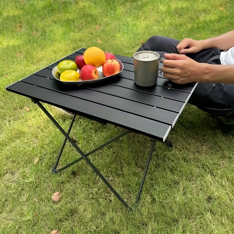 

Table pliante en alliage d'aluminium 7050, résistante à la corrosion et aux rayures, idéale pour le camping, les pique-niques et les barbecues en extérieur.