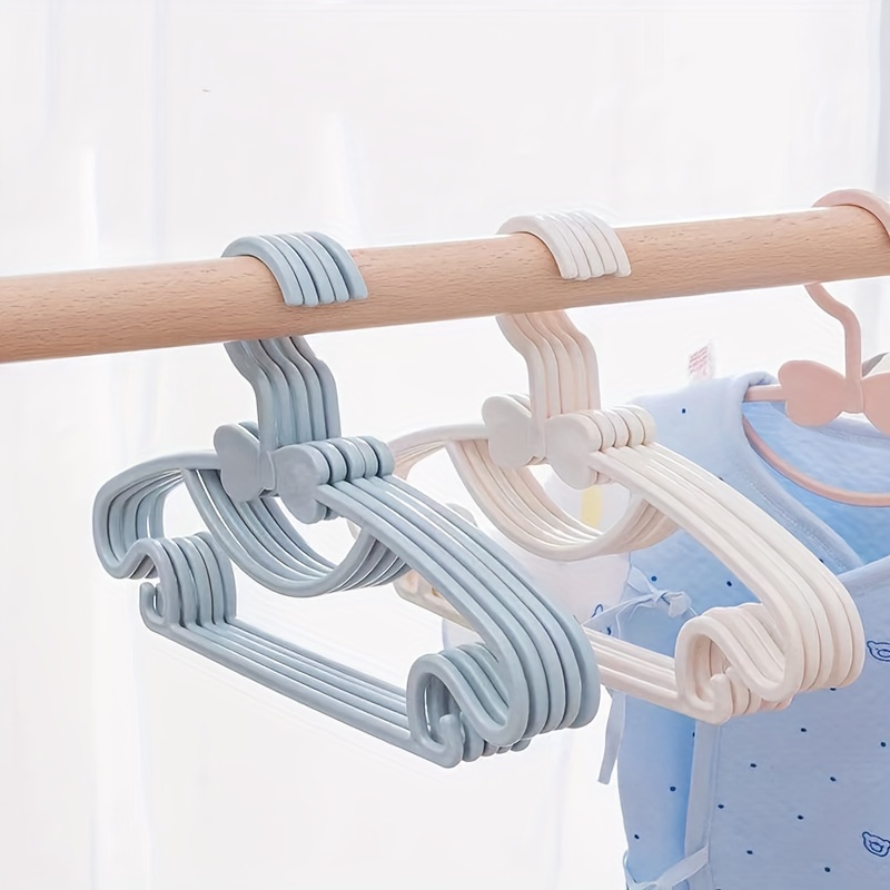 

10pcs Bowknot Children's Small Clothes Hanger, Baby Clothes Hanger, Multifunctional Traceless Clothes Drying Rack, Ideal Clothes Supplies