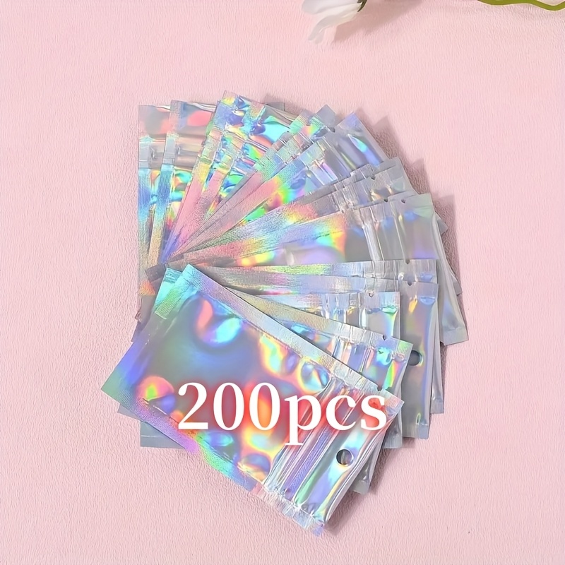 E-shop 200 Stück Holographische Selbstklebende - Wiederverwendbare, Staubsichere PE-Verpackung mit Laserschmuck für Schmuck, Kleinteile & Mehr |