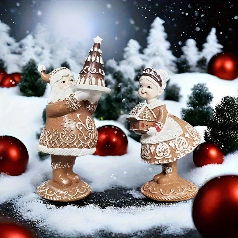 a set two resin statues featuring santa claus mrs claus - Temu