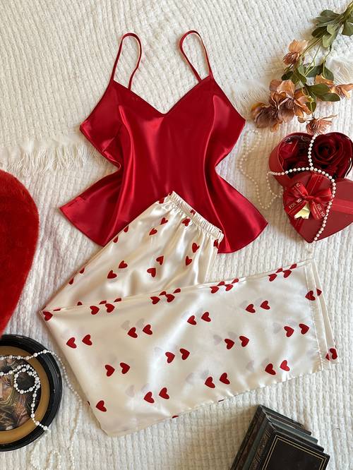 imagen del artículo conjunto de pijama de 2 piezas para mujer, camisola con estampado de corazones y pantalones largos a rayas en colores contrastantes, ideal para
