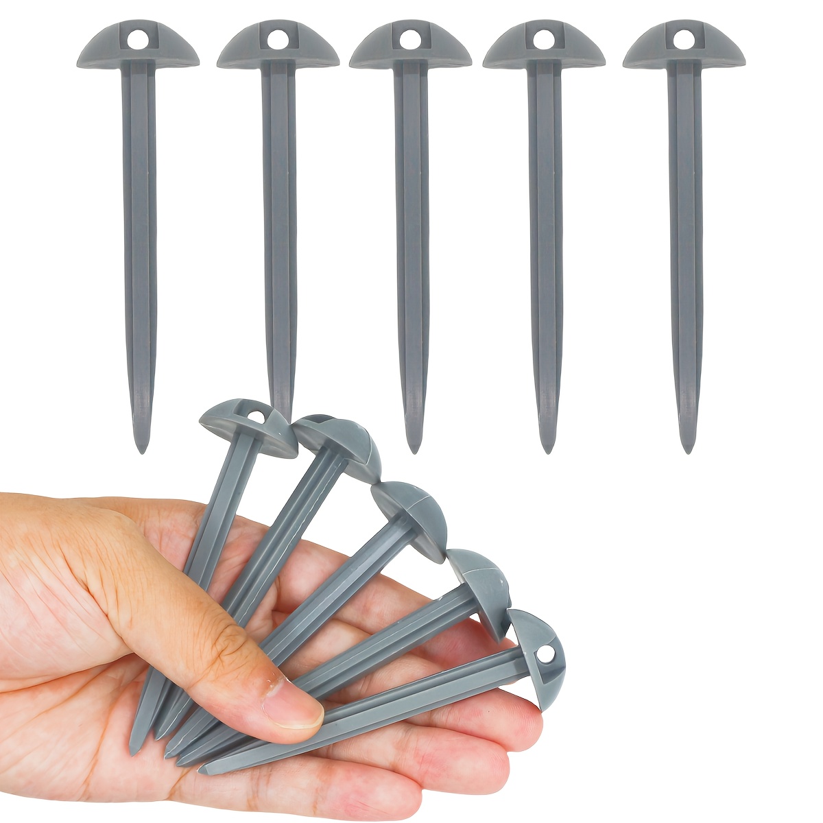 E-shop Set mit 36 robusten, grauen Zeltankern aus Kunststoff – rostbeständig, einfach zu installieren und unwahrscheinlich zu biegen oder zu brechen.