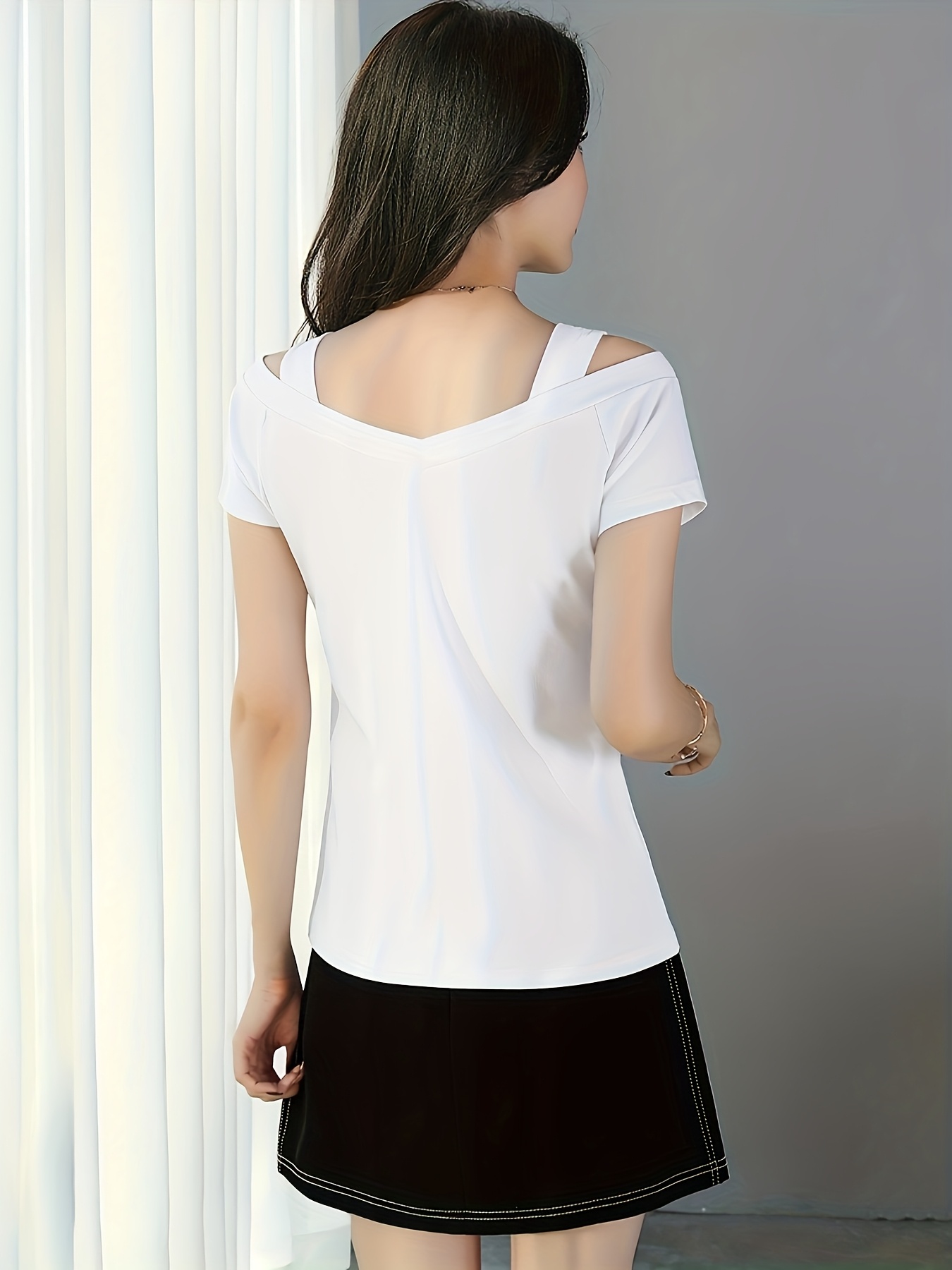An Elegant Off-Shoulder Short-Sleeve T-Shirt, Perfect for Summer