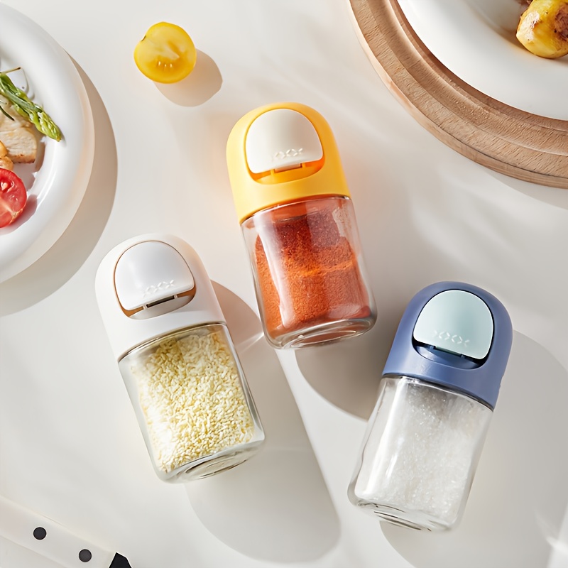 glass spice jar with precise dispenser push button controlled seasoning container anti   clear measurement cup for salt pepper herbs   countertop organizer ideal gift for home   chefs cooking essentials modern kitchenware   lid culinary enthusiasts Product details 3