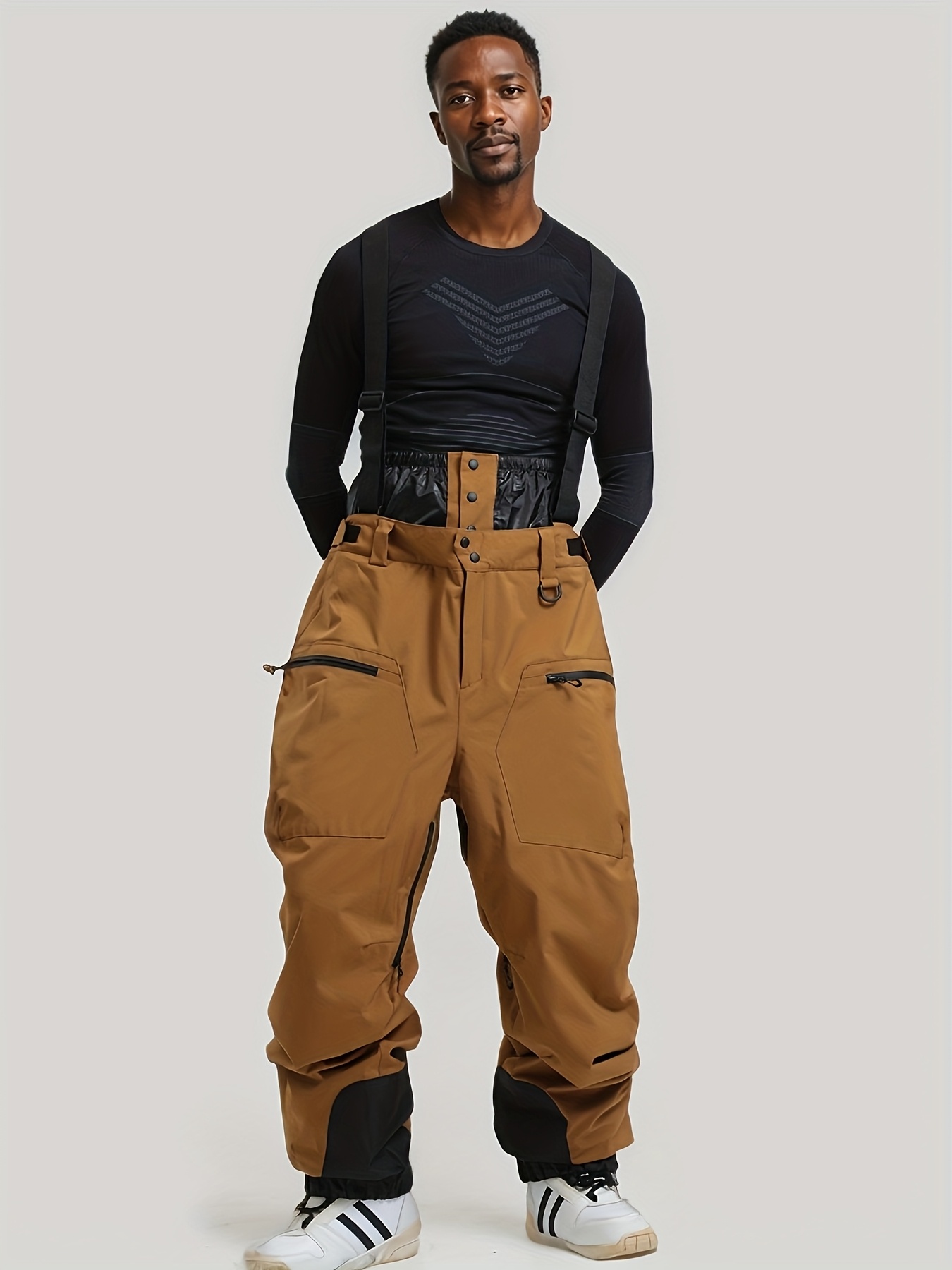 mens thick warm snow pants with adjustable strap waist black non stretch fabric multiple pockets washable polyester lining ideal for skiing and outdoor sports ski gear adjustable waist pants durable snow pants