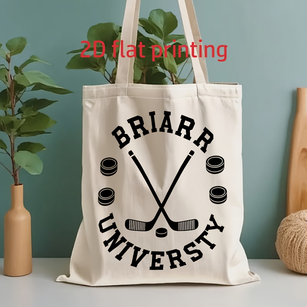 TEMU Sac fourre-tout plat 2D en toile - Décoration de bâton et de cale de hockey avec impression de "BRIARRUNIVERSITY", créant une sportive et