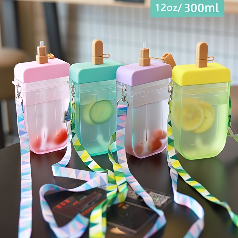 

1pc, Creative Ice Cream Popsicle Shape Water Cup, Plastic Water Bottle With Straw Cup Strap Bottle For Juice Drink Cup, Holiday Gift, Gift For Kitchen Supplies, Kitchen Accessories