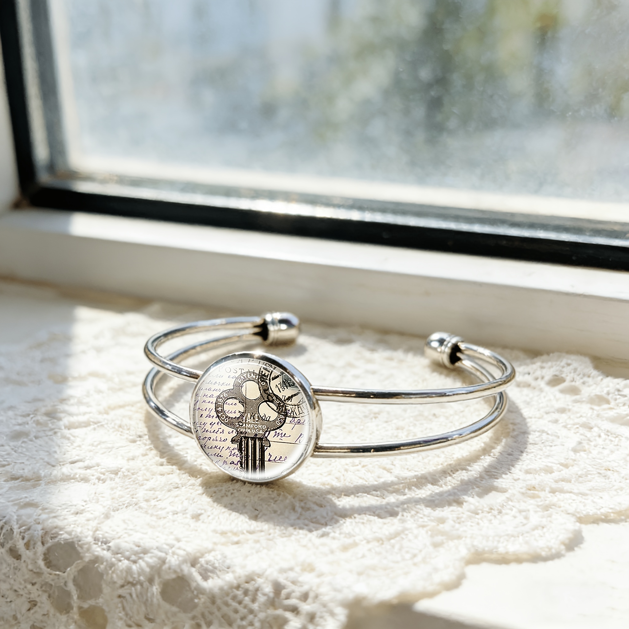 Adjustable Open Bangle with Retro Postage Stamp Design