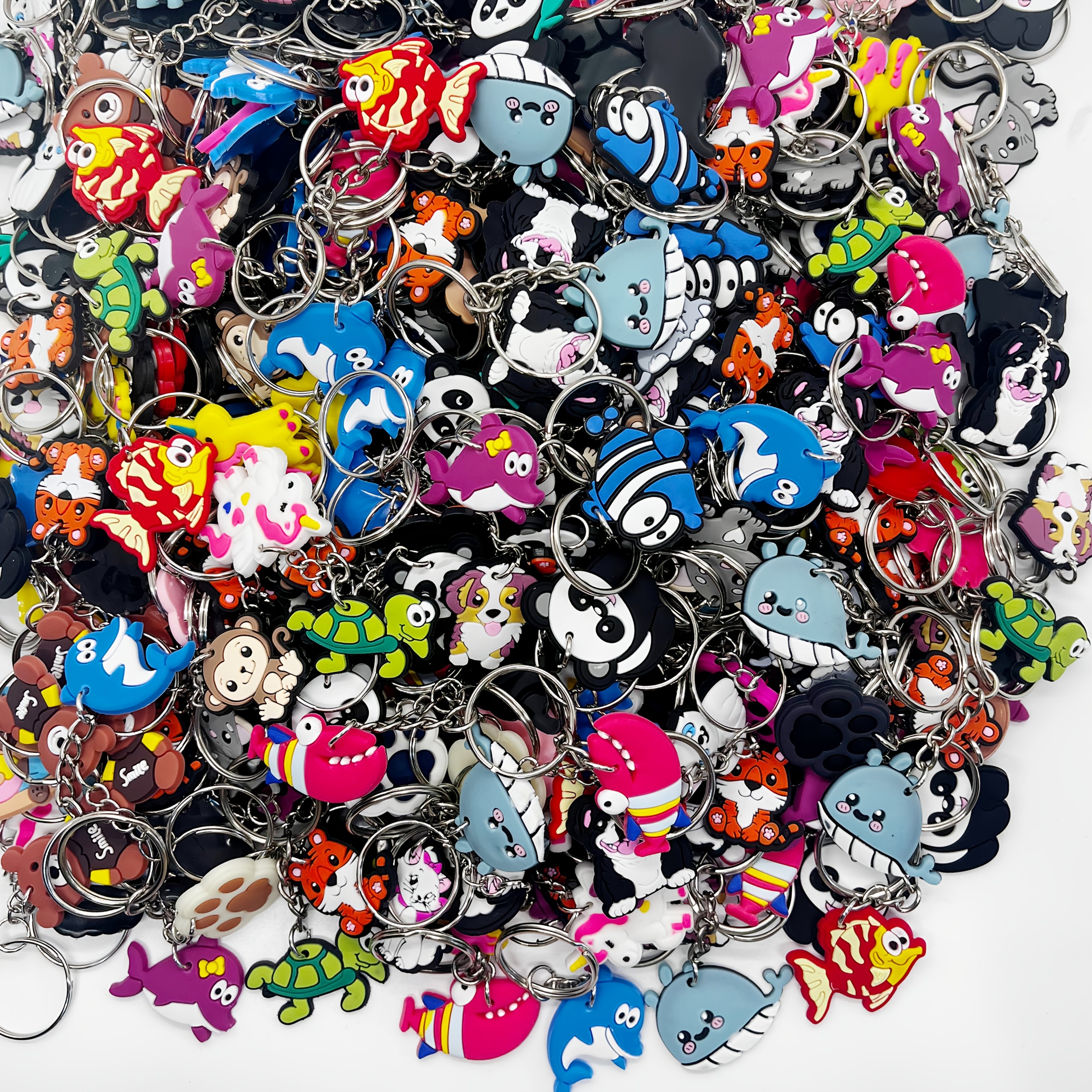 E-shop 60 Stück grenzüberschreitende DIY-Schlüsselanhänger aus PVC in zufälligem Stil – Ozean, Panda, , Pony, Katzenpfote, Katze, Anime gemischte Stile