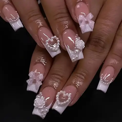 24pcs set of medium length ballet style nude colored false nails with floral and heart accents to make more suitable for all women a gel nail file as