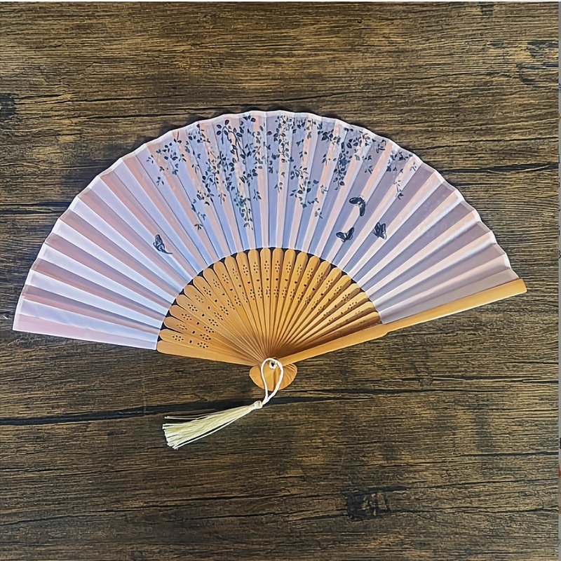 Image of 1pc And Bamboo Handheld Folding Fan With Tassel: An Elegant Fan That Traditional Chinese And Japanese Styles, Showcasing Of New Chinese Style And Exuding A Vintage And High-end Feel. An For Party