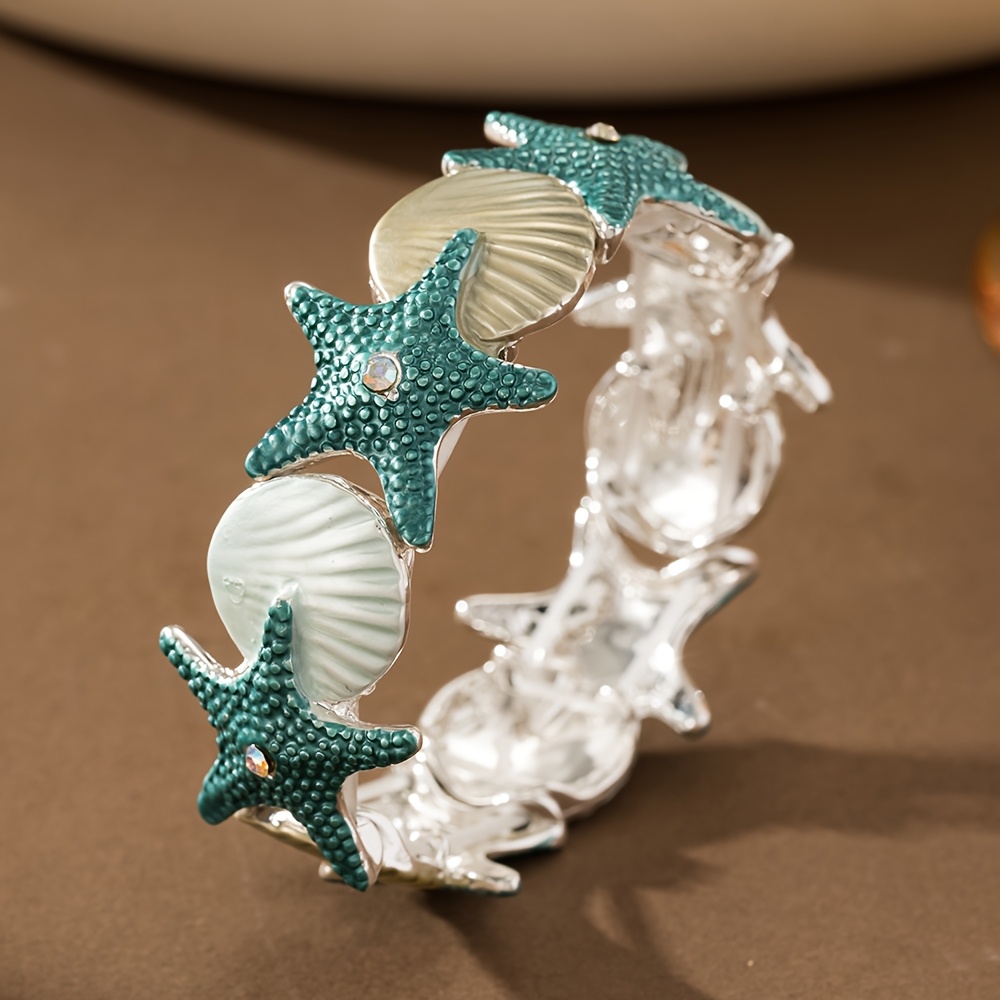 E-shop Modisches Bohemian Ozean-Stil Metallgehäuse Ozean-Stil Elastisches Armband Frühling und Sommer Neues Zinklegierung Dünne Beschichtungsprozess
