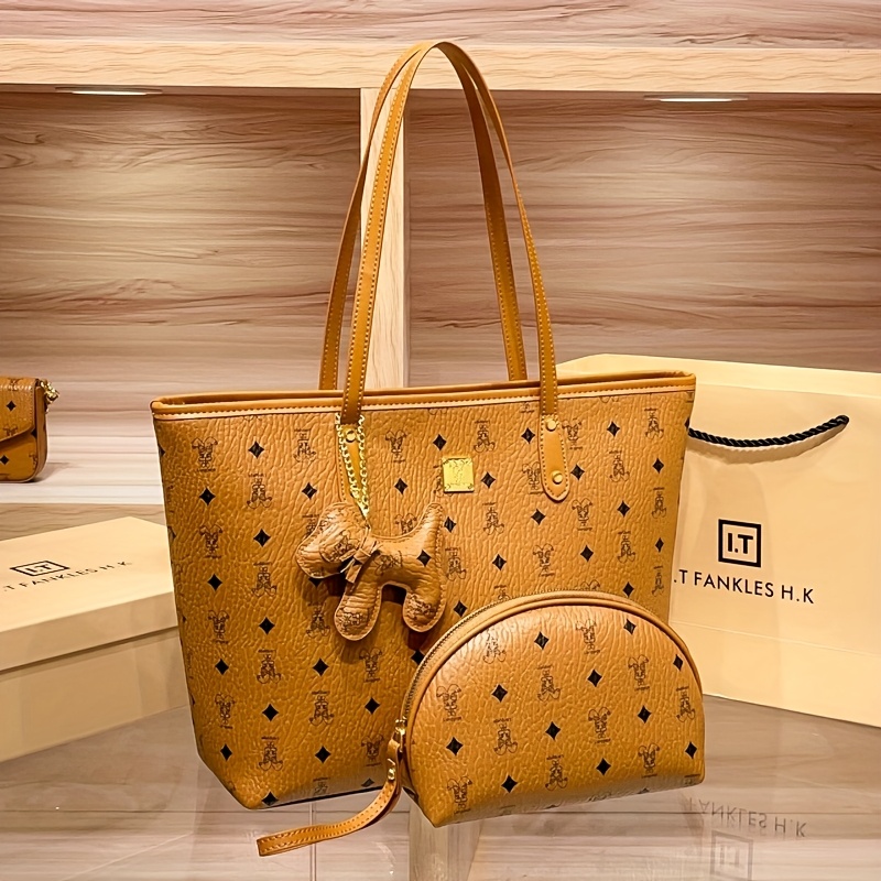 Image of "designer Inspired Light Brown Handbag - Trendy Vintage Animal Print Shoulder Bag With Golden Metal Details & Multi-compartment Design"