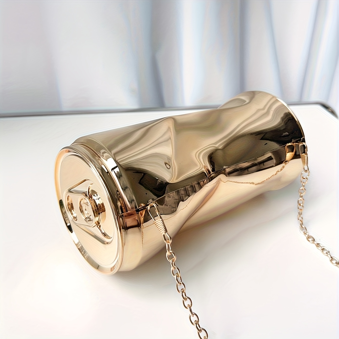 Electroplated glossy metallic chain evening bag, a stylish accessory for banquets and parties